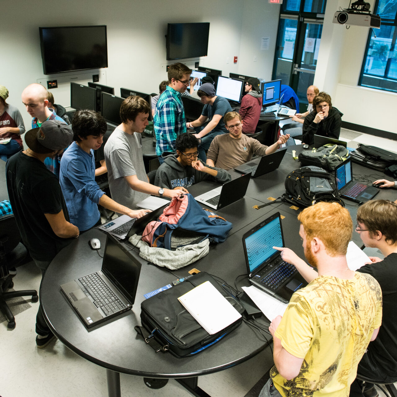 A class working together in a computer lab.